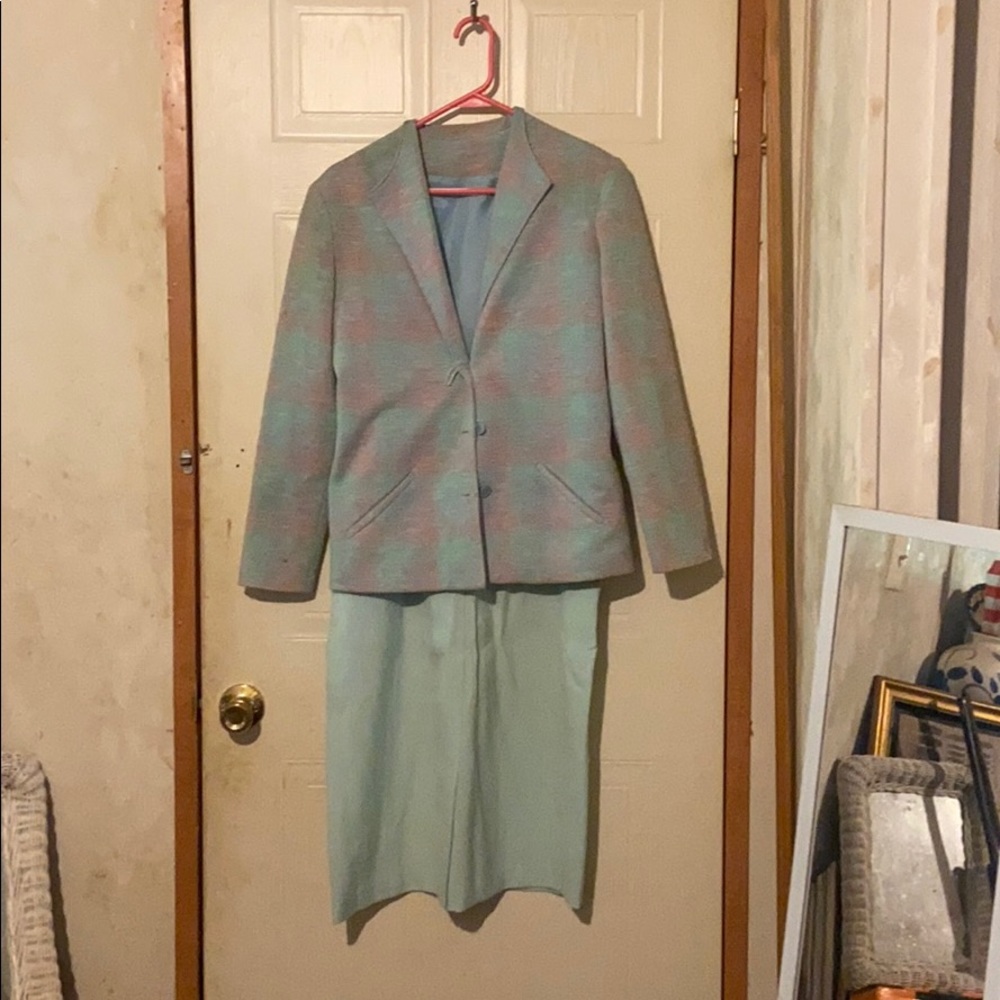 Vintage teal and pink blazer with a teal skirt